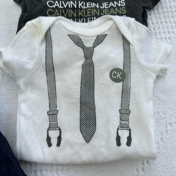 ⭐️2/$20 Calvin Klein | size 0-3m cute diaper onesie and jeans set. - Picture 3 of 4